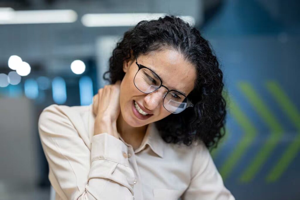 hispanic businesswoman in office feeling neck pain 2026 01 09 08 08 02 utc converted